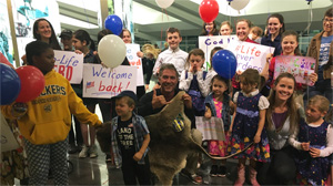 Newman Safely Home in U.S. But Promises Australia “I Shall Return”